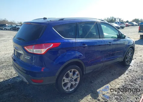 2016 Ford Escape Titanium z USA, uszkodzony, nr VIN 1FMCU0JX4GUB48809